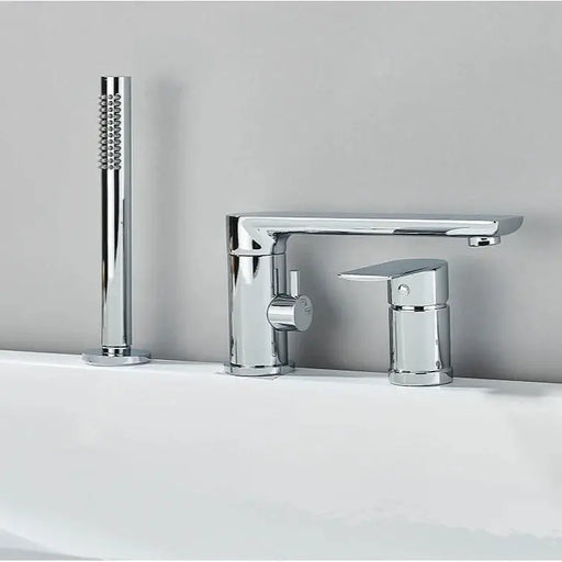 Chrome rotating spout bath mixer set with hand shower, deck-mounted in a modern bathroom.