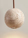 Nordic Round Travertine LED Pendant Light with stone yellow shade, perfect for modern home decor and elegant lighting.