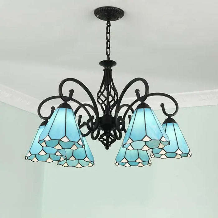 Mediterranean iron and stained glass LED chandelier with six blue shades, perfect for living rooms and bedrooms.