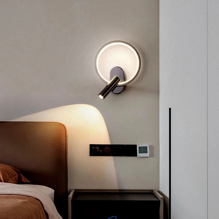 Modern rotatable LED headboard reading lamp in stylish bedroom setting.