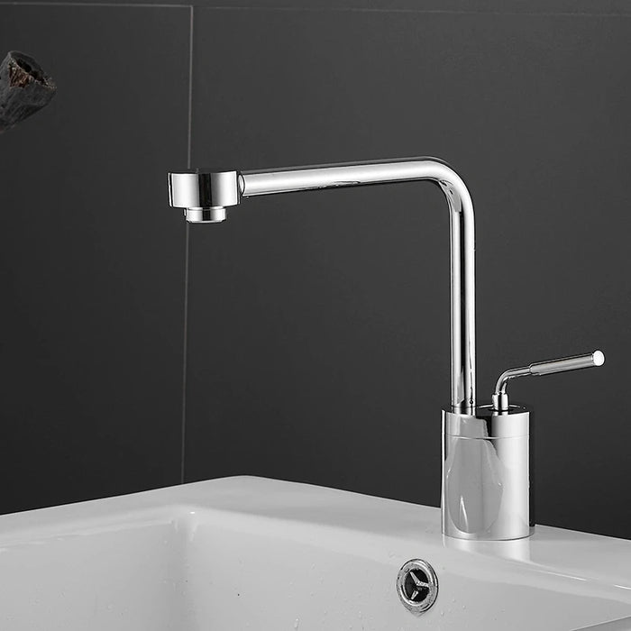 Chrome swivel arm deck-mount basin faucet on white sink in modern bathroom setting.