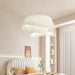 Elegant double-shade white wave fabric ceiling light in cozy bedroom setting