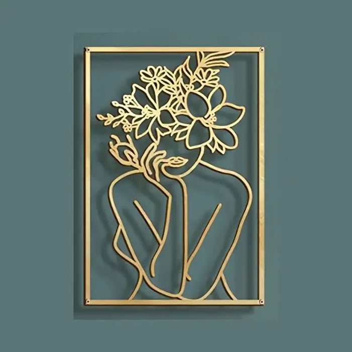 Abstract woman silhouette line sculpture with floral accents on teal wall, minimalist decor.