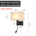 Modern bedside wall lamp with USB port, black body, white lampshade, and spotlight, showing dimensions for installation.