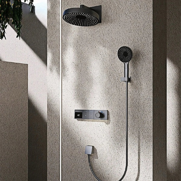 Luxury brass shower system with LED display and dual control design, featuring a sleek and modern look for a comfortable shower experience.