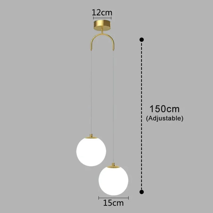 Modern round glass pendant light with brass finish, adjustable 150cm cord, featuring two LED globes, suitable for indoor spaces.