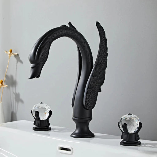 Luxury Swan Dual Crystal Handle Basin Mixer with electroplated gold finish and swan design for elegant bathroom decor.