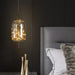 Starburst Glass Dome Pendant Light hanging beside a bed in a cozy bedroom setting, casting a warm glow.