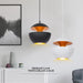 Modern apple pendant lights in black and white, perfect for stylish interiors, living rooms, and dining areas.