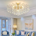 Luxury crystal lantern chandelier illuminating a modern living room with elegant decor.