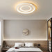 Modern geometric LED ceiling lamp in a stylish bedroom interior, showcasing elegance and high-quality ambient lighting.