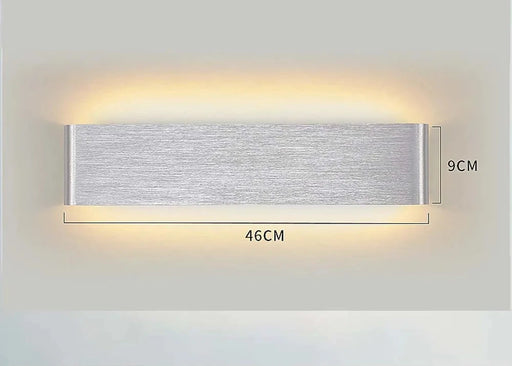 Modern aluminum LED wall sconce with up and down light, measures 46cm by 9cm, elegant indoor lighting fixture.