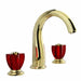 Luxury gold dual handle brass basin faucet with sleek modern design and red accents for elegant bathrooms.