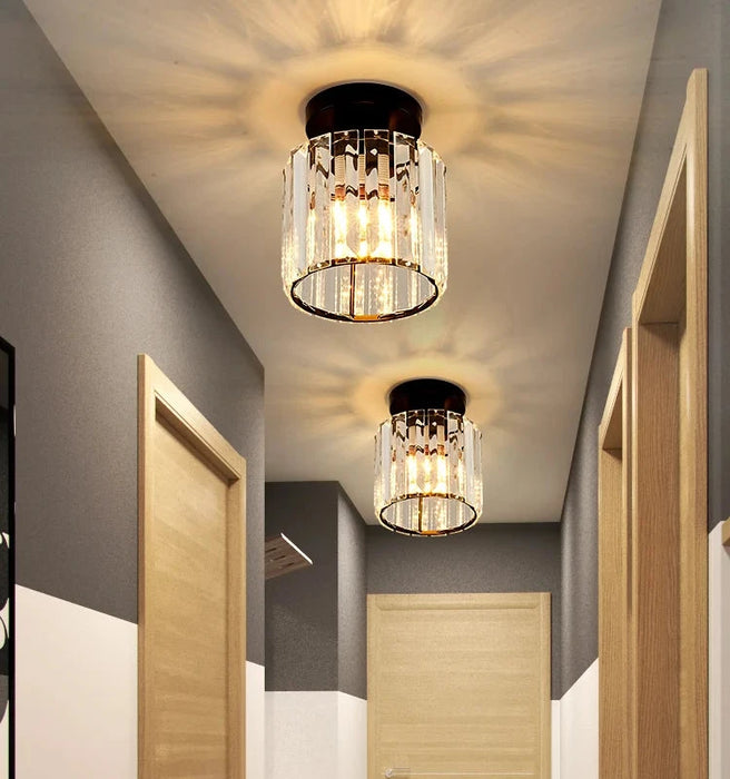 Crystal ceiling lampshade adorns a hallway, offering luxury and sophistication with polished finish and reliable AC power source.