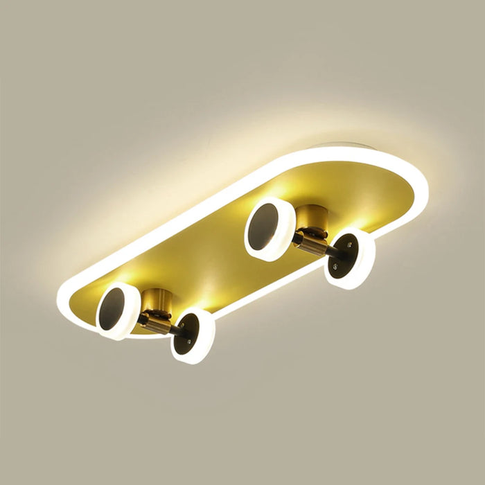 Modern yellow and black skateboard ceiling lamp with acrylic shade, ideal for children’s rooms, offering playful and vibrant decor.