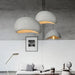 Japanese Wabi-Sabi Minimalist Pendant Chandelier in modern living room setting with grey and white decor.