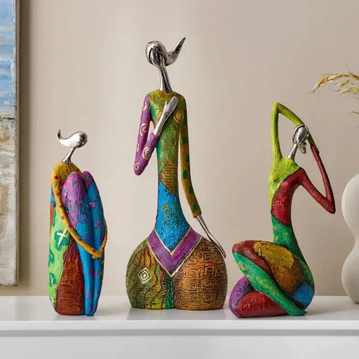 Vibrant Nordic abstract art figurines with colorful patterns, ideal for contemporary home decor and creative design statement pieces.