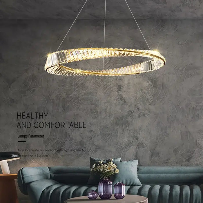 Circular crystal LED chandelier illuminating a modern living room with elegant design.