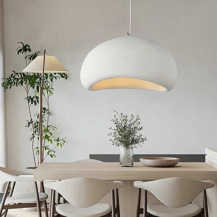 Japanese Wabi-Sabi Minimalist Pendant Chandelier in a modern dining room setting with wooden table and chairs.