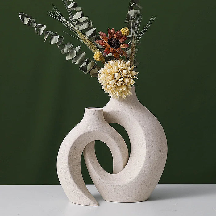 Nordic Boho Ceramic Vase Set with minimalist design, featuring flowers, perfect for contemporary or rustic home decor.