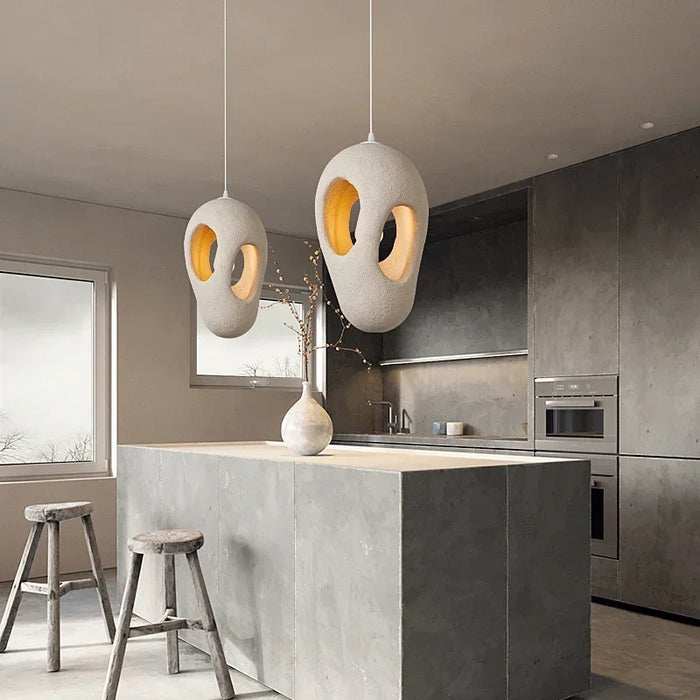 Japanese Wabi Sabi pendant lights in modern kitchen setting, featuring resin design and LED bulbs, ideal for stylish interiors.