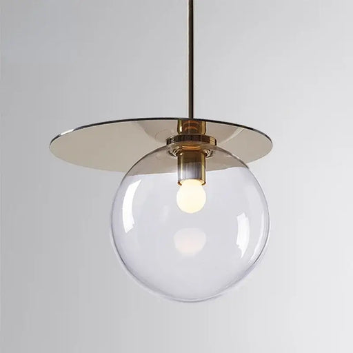 Clear glass pendant lamp with modern design and soft glow