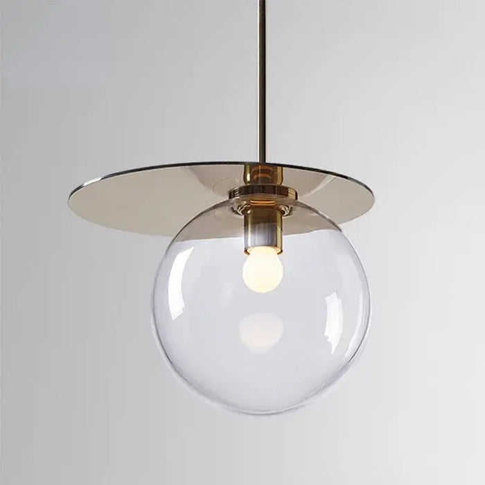 Clear glass pendant lamp with modern design and soft glow