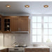 Retro cat eye LED ceiling lamps in modern kitchen setting with wooden cabinets and large window.