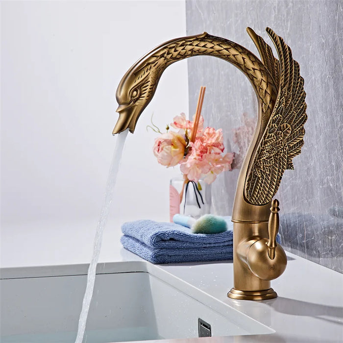 Luxury Swan Basin Mixer with elegant swan design, flowing water in modern bathroom setting.