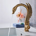 Luxury Swan Basin Mixer with elegant swan design, flowing water in modern bathroom setting.