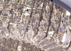 Close-up of luxury modern crystal round ceiling chandelier with shimmering crystal prisms and elegant design elements