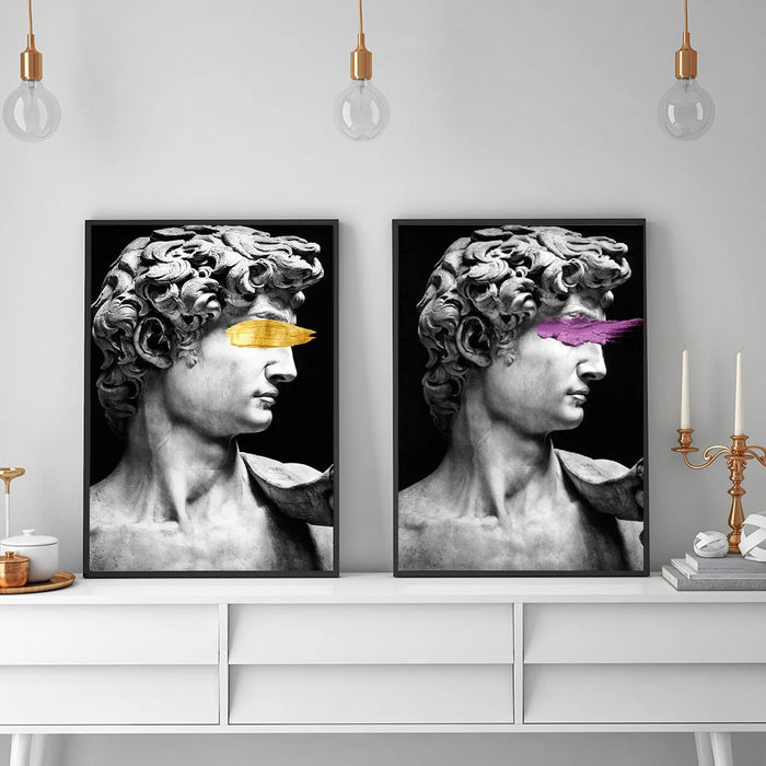 Michelangelo David graffiti art canvas prints on modern interior wall with decorative lighting and minimalist decor.