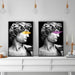 Michelangelo David graffiti art canvas prints on modern interior wall with decorative lighting and minimalist decor.