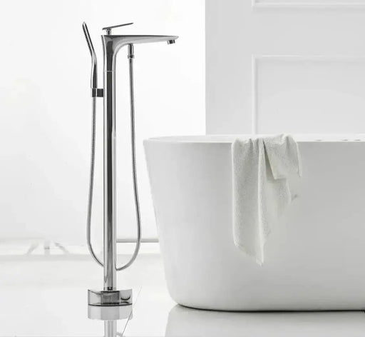 Sleek floor standing bathtub mixer in modern bathroom setting, combining luxury and functionality with minimalist design.