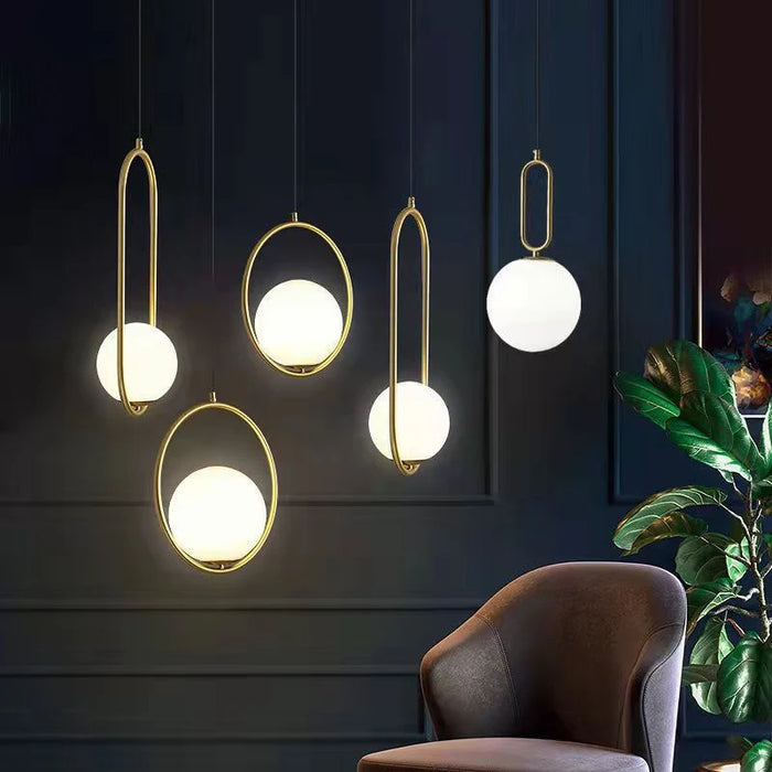 Modern Nordic pendant lamps with metal and glass design, featuring LED bulbs, suitable for parlor or study lighting.