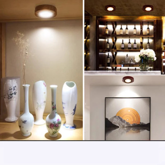 Modern LED surface mounted downlight illuminating decorative vases and a stylish home bar area.