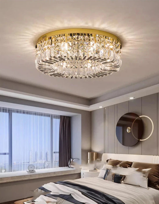 Luxury modern crystal round ceiling chandelier in elegant bedroom interior.