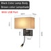 Modern bedside wall lamp with USB port and spotlight, black body, brown lampshade, dimensions labeled for convenient bedroom lighting.