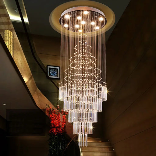 Grand Spiral Crystal Chandelier illuminating a staircase with a modern design and luxurious cascading crystals.