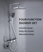 Luxury rainfall shower system with 4 water outlets, featuring a rainfall shower head, hand-held shower, bidet spout, and tub faucet.