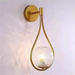 Gold Nordic Elegance drop wall lamp with frosted glass shade, G9 base LED, up and down light direction, wall mounted.