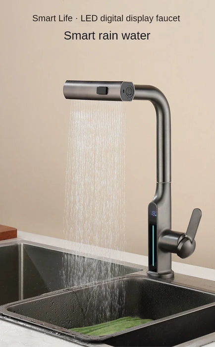 Hydroelectric kitchen faucet with LED temperature display showing water flowing from smart rain water mode in a modern sink.