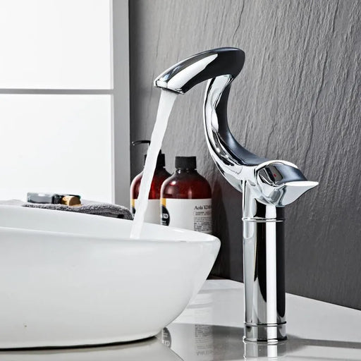 Chrome Flamingo Design Deck-Mount Basin Faucet with flowing water in modern bathroom setting.