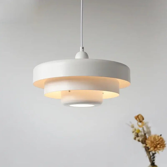 White Danish Modern LED Pendant Light hanging in a minimal interior setting