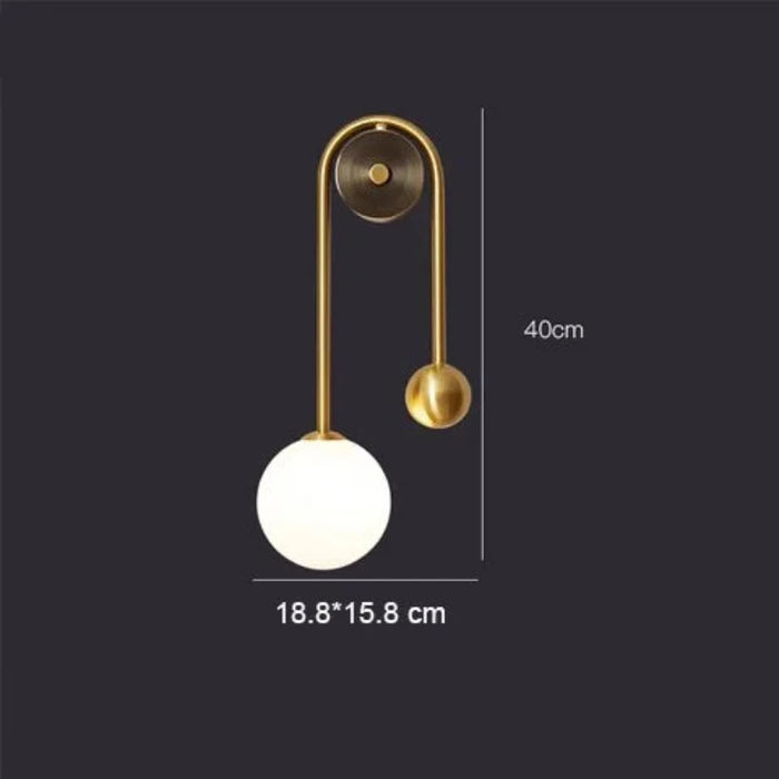 Modern gold LED wall sconce with frosted glass ball and dimensions, perfect for contemporary home lighting.