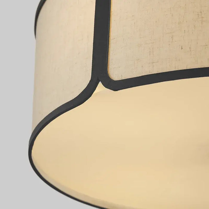 Close-up of Zen Circular Fabric Chandelier with dual-layer fabric shade casting a soft glow, embodying modern and retro aesthetics.