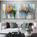 Vibrant Cityscape oil painting with colorful geometric abstract design displayed in a modern living room setting.