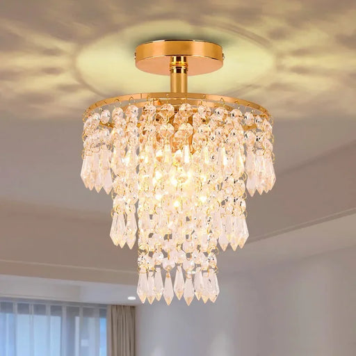 Elegant three-tier crystal ceiling chandelier with LED lights, perfect for kitchens and dining rooms, featuring plated stainless steel design.