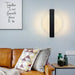 Modern Nordic gold foil LED wall lamp in a stylish living room setting