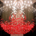 Luxury crystal chandelier with red and clear stones and dimmable LED lighting for elegant home decor.